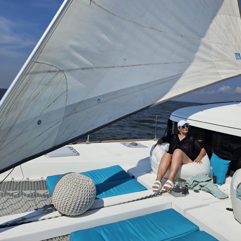 a person riding on the back of a boat