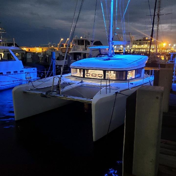 a boat is docked next to a body of water